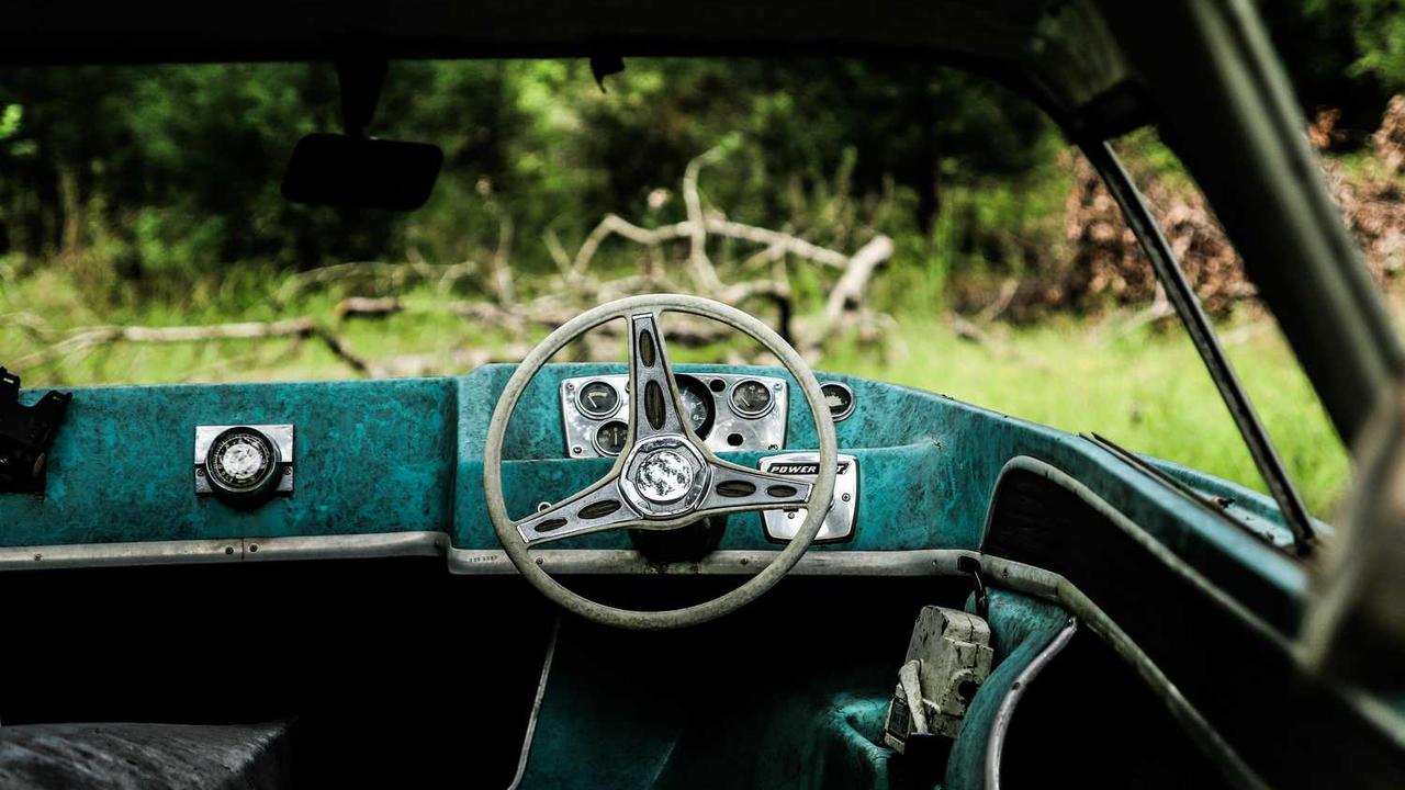 vintage car in the woods